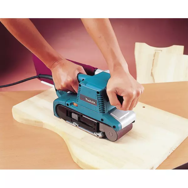Makita Belt Sander 1010 W Power, 76x553 mm Belt Size and 210-440 m/min Speed With Accessories, 9903
