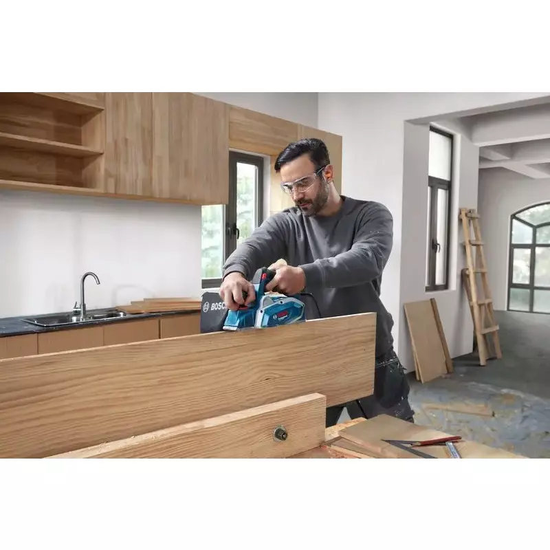 bosch-600-w-electric-planer-16500-rpm-no-load-speed-and-82-mm-planing-width-06015962f0-with-in-built-planing-blade