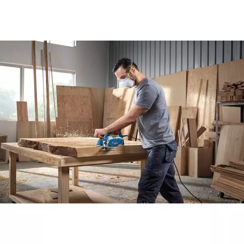 bosch-600-w-electric-planer-16500-rpm-no-load-speed-and-82-mm-planing-width-06015962f0-with-in-built-planing-blade