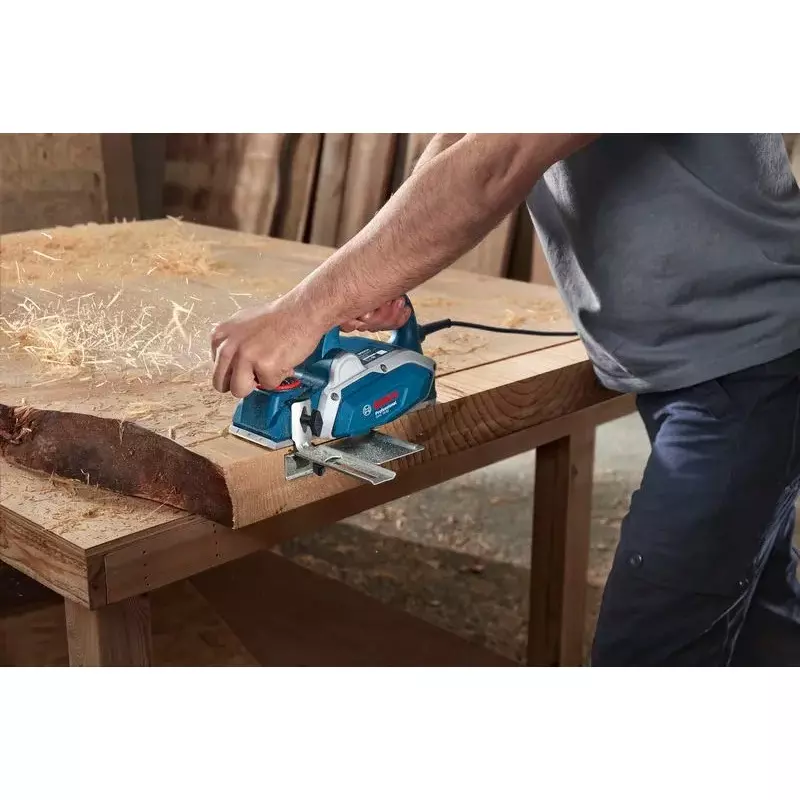 bosch-600-w-electric-planer-16500-rpm-no-load-speed-and-82-mm-planing-width-06015962f0-with-in-built-planing-blade